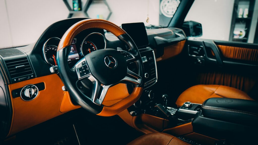 pexels-photo-12989554-12989554 Explore the plush interior of a Mercedes-Benz G-Class featuring premium materials and modern design.